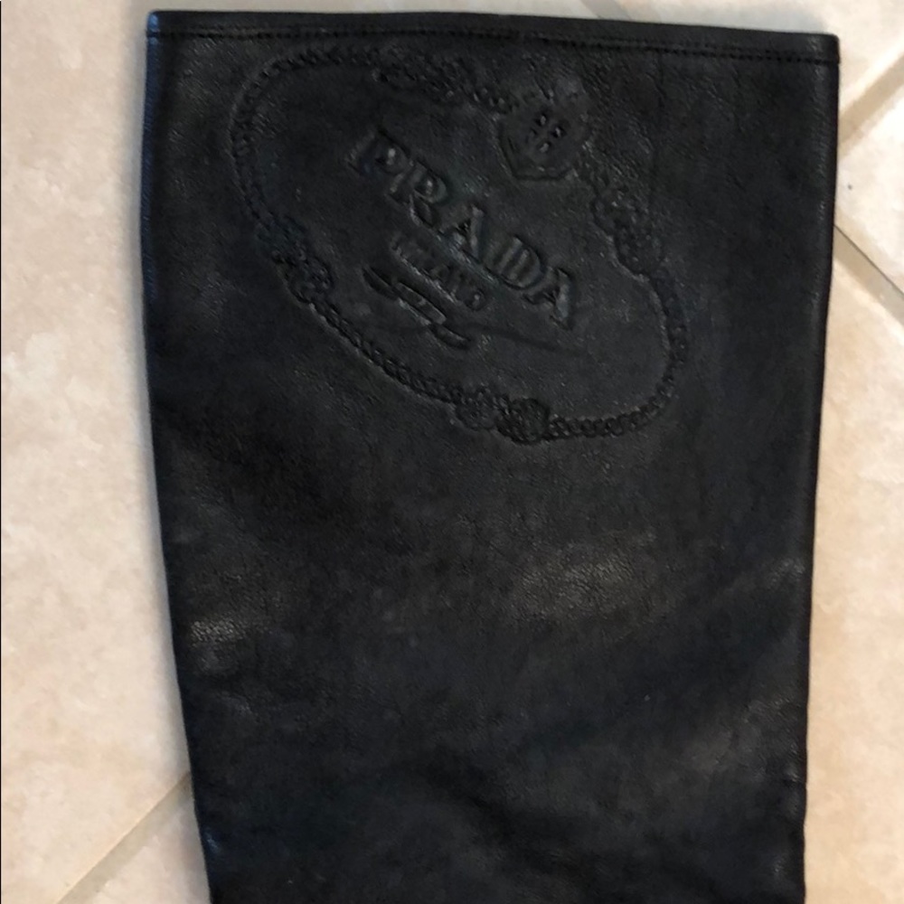 Bellow knee length leather Prada boots